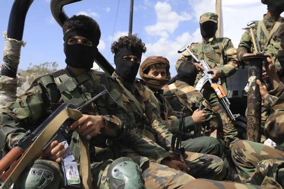 epaselect epa11142623 Houthi troopers ride on the back of a pick-up vehicle while on patrol in Sana'a, Yemen, 10 February 2024. The US designation of the Houthis as a terrorist group will take effect on 16 February, if the militia does not stop its strikes on ships in the Red Sea and the Gulf of Aden, according to a statement by US ambassador to Yemen Steven Fagin. In January 2024, the US Department of State designated Yemen's Houthis as a 'Specially Designated Global Terrorist group' due to their increased attacks on shipping lanes. In December 2023, the US Department of Defense announced a multinational operation to safeguard trade and protect ships in the Red Sea in response to the escalation of Houthi attacks.  EPA/YAHYA ARHAB