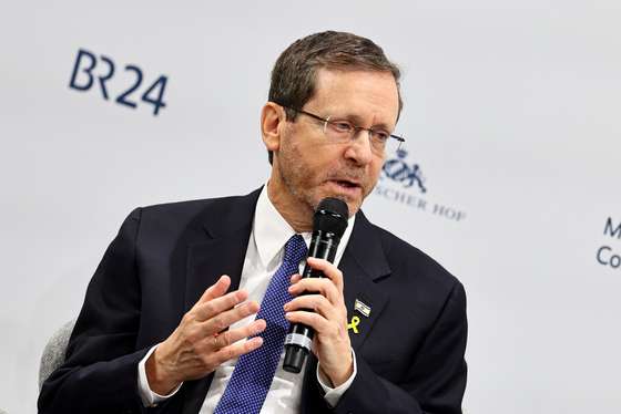 epa11161883 Israeli President Isaac Herzog attends a panel talk at the 'Bayerischer Hof' hotel, the venue of the 60th Munich Security Conference (MSC), in Munich, Germany, 17 February 2024. More than 500 high-level international decision-makers meet at the 60th Munich Security Conference in Munich during their annual meeting from 16 to 18 February 2024 to discuss global security issues.  EPA/ANNA SZILAGYI