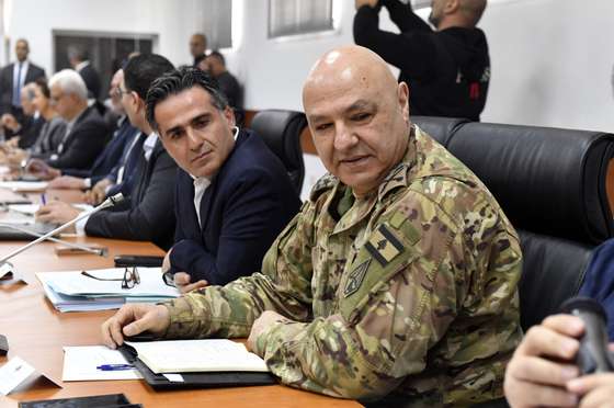 epa11761855 Commander of the Lebanese Armed Forces, General Joseph Aoun (R) attends a cabinet meeting at Benoit Barakat barracks in Tyre, southern Lebanon, 07 December 2024. The Lebanese government held a cabinet meeting in Tyre to discuss a number of issues related to the operational plan to increase the deployment of the army, a draft law for the restoration of demolished buildings and a mechanism for surveying agricultural damage, in addition to measures related to the removal of rubble, according to Lebanon's National News Agency (NNA).  EPA/WAEL HAMZEH