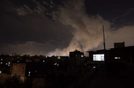 epaselect epa11966709 Smoke rises from a position following airstrikes in Sana'a, Yemen, 15 March 2025. Three airstrikes targeted a neighborhood in Sana'a, causing powerful explosions, the Houthis-run Al-Masirah TV has reported.  EPA/YAHYA ARHAB