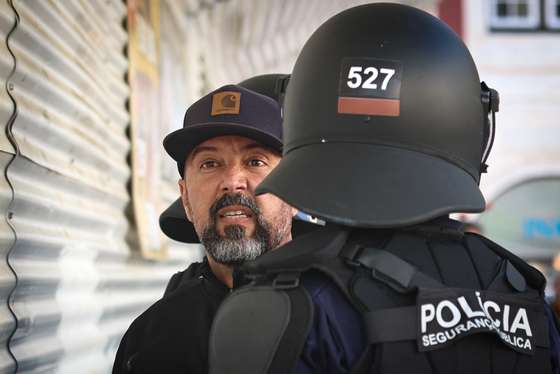 Police arrest Mario Machado, a right-wing extremist, at an unauthorised rally hold by the organizations "Rise" and "Habeas Corpus" and supported by "1143 Group" in Lisbon downtown, place with a great concentration of immigrants, during the celebrations of the 25th April 1974 Carnation Revolution that ended the authoritarian regime of Estado Novo (New State) that ruled the country between 1926 to 1974, Lisbon, 25th April 2025. ANTONIO COTRIM/ LUSA