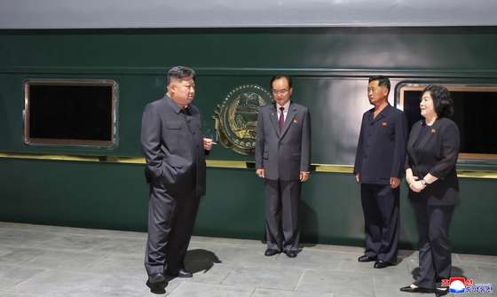 epa12344642 A photo released by the official North Korean Central News Agency (KCNA) shows North Korean leader Kim Jong Un (L) standing by his private train before departing for Beijing in Pyongyang, North Korea, 01 September 2025 (issued 02 September 2025). The North Korean leader departed on 01 September on his private train to Beijing to attend celebrations marking the 80th anniversary of the victory of the Chinese People&acirc;s War of Resistance Against Japanese Aggression and the World Anti-Fascist War, according to Kim Chon Il, director of the DPRK Foreign Ministry&acirc;s Department of Press and Information.  EPA/KCNA  EDITORIAL USE ONLY