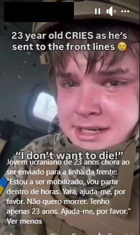 Publica&Atilde;&sect;&Atilde;&pound;o de Facebook que alega partilhar uma imagem de um jovem ucraniano a chorar ao ser enviado para a linha da frente da guerra com a R&Atilde;&ordm;ssia.