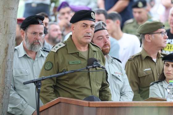 epa12517812 IDF chief of staff Eyal Zamir addressing mourners during the funeral of late Israeli hostage soldier Hadar Goldin in the military cemetery of Kfar Saba, Israel, 11 November 2025. Hadar Goldin was killed by Hamas on 01 August 2014 his body had remains in captivity ever since the 2014 Israel Gaza war or Operation Protective Edge.  Hadar Goldin's body was return as part of the current ceasefire deal between Israel and Hamas. Four bodies of Israeli hostages are still to be returned to Israel by Hamas.  EPA/ABIR SULTAN / POOL