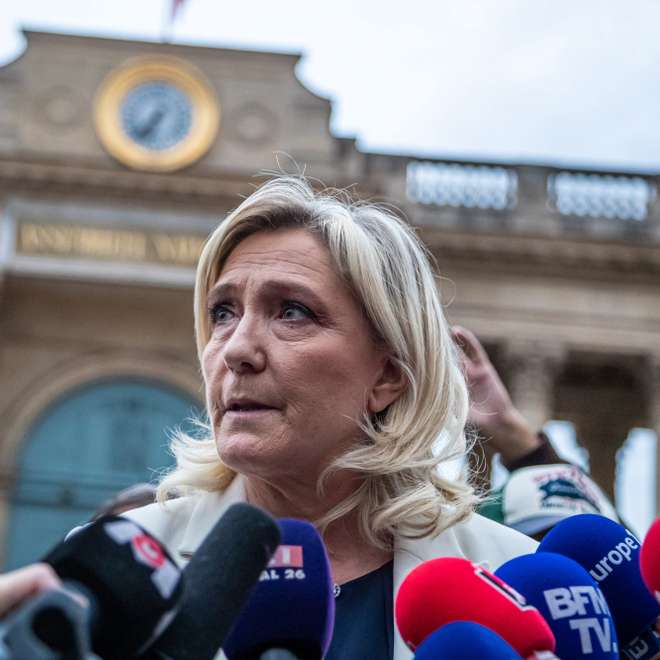 epa10255214 French far-right party Rassemblement National (RN) leader and Member of Parliament Marine Le Pen speaks to media after a gathering in front of the National Assembly to observe a minute of silence for Lola,  a young girl murdered in a northern district of French capital, in Paris, France, 20 October 2022. Lola, aged 12, was found dead in a trunk near the building where her parents are caretakers. Her death has sparked a political controversy over immigration as an Algerian woman has been arrested and is suspected of being the perpetrator.  EPA/CHRISTOPHE PETIT TESSON