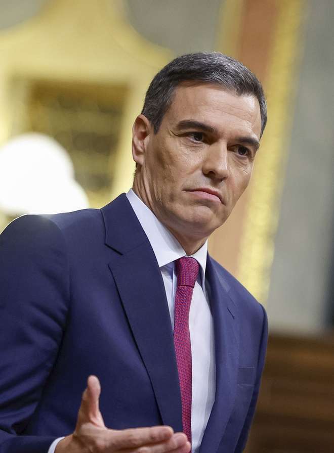 epa10976444 Spain's Acting Prime Minister Pedro Sanchez delivers a speech during the first day of his investiture debate at the Lower House of the Spanish Parliament, in Madrid, Spain, 15 November 2023. Pedro Sanchez faces his investiture debate in the parliament at a time of great political tension around the amnesty law. He is expected to be invested in a second term this week after PSOE party reached a deal with Catalan pro-independence party Junts per Catalunya (JxCat), led by former Catalan president Carles Puigdemont, by which Catalan separatists involved in the so-called independence 'process' in 2017 would be amnestied in exchange of the key support of seven JxCat MPs, among other concessions.  EPA/Daniel Gonzalez