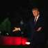 epa13278005 United States President Donald Trump motions to new pavement as he arrives on the South Lawn in Washington, DC, USA, 02 October 2026.  EPA/Annabelle Gordon / POOL