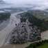 epa13219536 An aerial view of Devighat, one of the flood affected villages in Nuwakot district, Nepal, 07 September 2026. Nepal is observing a national day of mourning on 07 September on the 13th day following devastating flash floods. More than 1,200 people have been killed, and over 4,000 remain missing across northern Nepal after a glacial collapse and avalanche-triggered flash floods and mudslides along the Bhotekoshi and Trishuli river valleys near the Nepal-Tibet border, causing widespread destruction to settlements and infrastructure, according to the National Disaster Risk Reduction and Management Authority (NDRRMA).  EPA/NARENDRA SHRESTHA