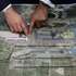 Plano do novo Aeroporto Luis de Camões durante a entrega do Relatório Inicial (High Level Assumption Report) da concessionária ANA sobre o desenvolvimento da capacidade aeroportuária de Lisboa,  para iniciar formalmente negociações sobre a extensão do contrato de concessão e viabilizar a construção do novo Aeroporto Luís de Camões, em Alcochete, 17 de dezembro de 2024.  ANDRÉ KOSTERS/LUSA