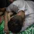 epa13270545 Relatives mourn over the body of Ezz al-Din Beik, commander of the Northern Gaza Brigade of the Ezz al-Din al-Qassam Brigades, the armed wing of Hamas, during the funeral of Beik and his bodyguard in Gaza City, 29 September 2026. According to the Ministry of Health in Gaza, Beik and his bodyguard were killed in an Israeli airstrike in Gaza City early on 29 September 2026.  EPA/MOHAMMED SABER