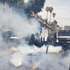 epa13314316 Protesters clash with police while they demonstrate to mark the seventh anniversary of the social uprising in the country, in Santiago, Chile, 18 October 2026.  EPA/Elvis Gonzalez