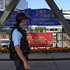 epa13274334 A Hong Kong police officer walks along a bridge in Hong Kong, China, 01 October, 2026. The city celebrates China's National Day on 01 October 2026, marking the 77th founding anniversary of the People's Republic of China.  EPA/MAY JAMES