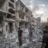 epa13290962 Palestinians inspect the rubble of destroyed homes following an Israeli airstrike in the Al-Sabra neighborhood of Gaza City, 09 October 2026. According to a report from the Ministry of Health in Gaza, at least three Palestinians, including an eight-year-old boy, were killed and eight others injured in an Israeli airstrike last night in Gaza City.  EPA/MOHAMMED SABER