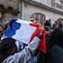epa13288526 A student holds up a French national flag while demonstrating outside the Carmes campus of the Institut Catholique de Paris (ICP), in Paris, France, 08 October 2026. A wave of nationwide protests by high school students has been sweeping across France since late September 2026, later joined by university students, over severe teacher shortages, overcrowded lecture halls and classrooms, resource deficits, and poor learning conditions.  EPA/FIRAS ALTOUKHI
