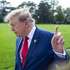 epaselect epa13309727 US President Donald Trump gestures to reporters as he departs the White House for a rally in Georgia, in Washington, DC, USA, 16 October 2026. President Trump will participate in a midterm rally in Dalton, Georgia, in support of local candidates Rick Jackson and Rep. Mike Collins.  EPA/JIM LO SCALZO