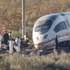 epa13338292 Emergency services members and security forces officers work at the scene of a collision between two high-speed trains, Iryo and AVE, in the village of Urda, Toledo, Spain, 29 October 2026. At least 68 people have been killed and dozens more injured in the accident on 28 October in the province of Toledo, south of the Spanish capital, Madrid.  EPA/J.J. GUILLEN