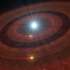 Imagem artística do disco de restos em torno da anã branca J1328−1450