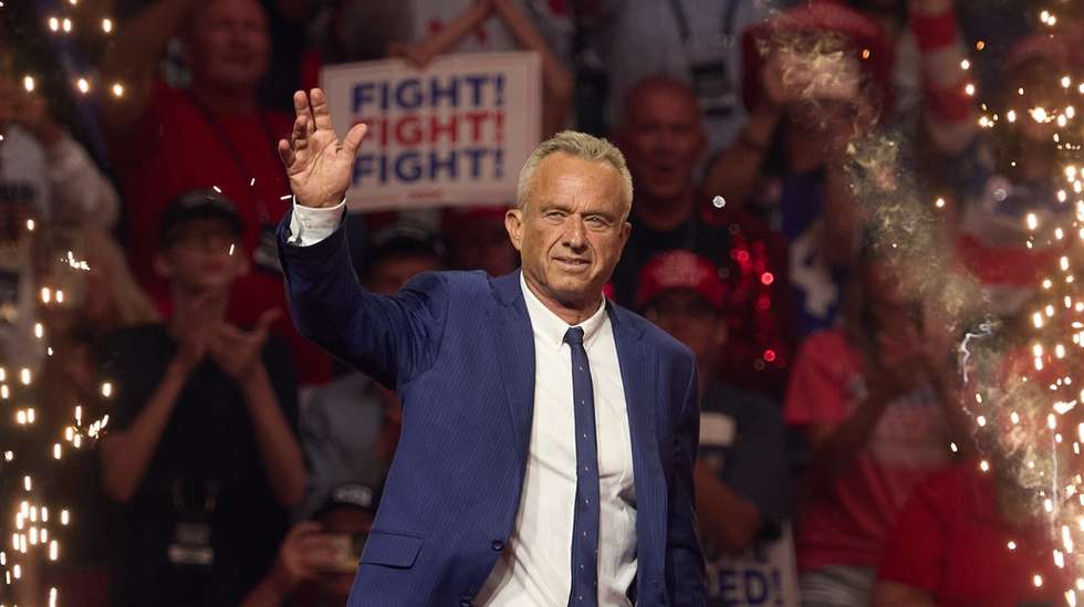 epa11562391 Robert F. Kennedy Jr. arrives at an election rally for Republican presidential nominee Donald J. Trump at the Desert Diamond Arena in Glendale, Arizona, USA, 23 August 2024. The US presidential election takes place on 05 November 2024. Kennedy announced earlier today that he is ending his campaign for the presidency and endorsing Republican presidential nominee Donald Trump.  EPA/ALLISON DINNER