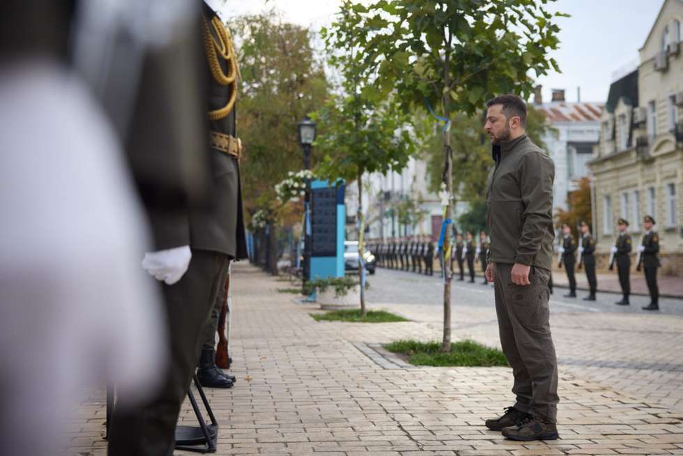 epa10243786 A handout photo made available by the Ukrainian presidential press service shows Ukrainian President Vlodomyr Zelensky (R) during a wreath laying ceremony at the  Memory Wall of the Fallen Defenders of Ukraine in Kyiv, Ukraine, 14 October 2002, on Defenders Day. Ukrainians mark Defenders Day annually on this day since 2015.  EPA/UKRAINIAN PRESIDENTIAL PRESS SERVICE HANDOUT  HANDOUT EDITORIAL USE ONLY/NO SALES