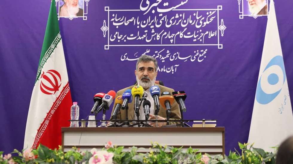 epa07983322 A handout photo made available by the Iran Atomic Energy Organisation shows Iran's Atomic Energy Organisation Behrouz Kamalvandi (C) speaking to local journalists during a press conference inside of the Iran's Fordow nuclear facility, in Fordow, Qom province, 09 November 2019. Media reported following president Rouhani's announcement of the country's fourth step in reducing its nuclear commitment to the Joint Comprehensive Plan of Action (JCPOA), Iran started injecting uranium gas into 1,044 advanced centrifuges'.  EPA/HANDOUT  HANDOUT EDITORIAL USE ONLY/NO SALES