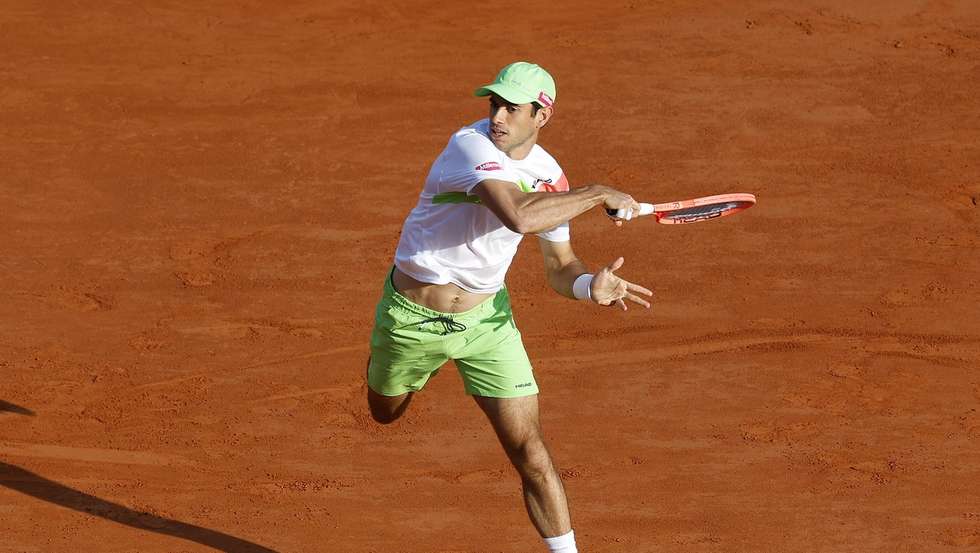 epa12023121 Nuno Borges of Portugal in action during his third round match against Stefanos Tsitsipas of Greece at the ATP Monte Carlo Masters tennis tournament in Roquebrune Cap Martin, France, 10 April 2025.  EPA/SEBASTIEN NOGIER