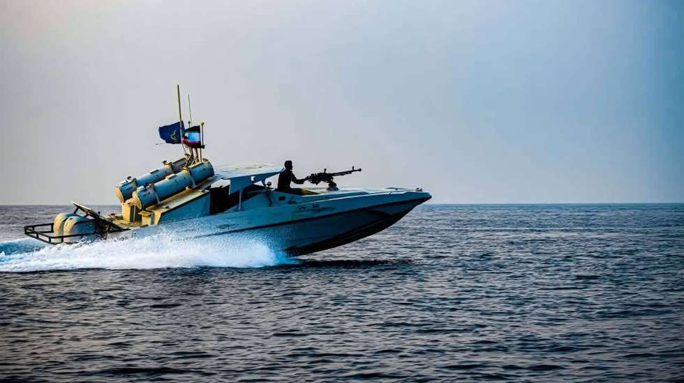 epa12571447 A handout photo made available on 05 December 2025 by the Islamic Revolutionary Guard Corps (IRGC) shows a jet boat taking part in a military drill in the waters off southern Iran coast. Iran's IRGC Navy has launched a two-day naval exercise across the Persian Gulf, the Strait of Hormuz, and the Sea of Oman. The drill aims to demonstrate the Navy's operational capabilities, including the deployment of advanced homegrown air defense systems and the utilization of missiles and drones.  EPA/IRGC HANDOUT  HANDOUT EDITORIAL USE ONLY/NO SALES