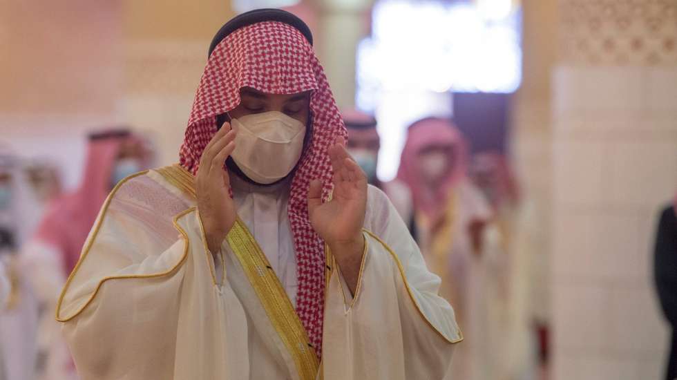 epa09196375 A handout photograph made available by the Saudi Royal Court shows Saudi Arabia's Crown Prince Mohammed bin Salman taking part in Eid al-Fitr prayers in Riyadh, Saudi Arabia, 13 May 2021. Muslims around the world are celebrating Eid al-Fitr, the three day festival marking the end of the Muslim holy fasting month of Ramadan. Eid al-Fitr is one of the two major holidays in Islam.  EPA/SAUDI ROYAL COURT HANDOUT  HANDOUT EDITORIAL USE ONLY/NO SALES
