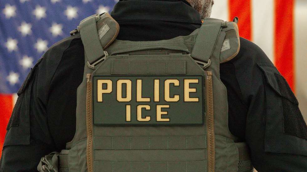 epa12844849 A US Immigration and Customs Enforcement (ICE) agent patrols the John F. Kennedy International Airport, amid congestion caused by the Department of Homeland Security (DHS) shutdown, in the Queens borough of New York, New York, USA, 23 March 2026. ICE agents have begun deploying to major US airports to assist the Transportation Security Administration (TSA) as a partial government shutdown triggers widespread security checkpoint delays. With the Department of Homeland Security (DHS) facing a funding lapse, TSA screeners and thousands of other federal employees are currently working without pay.  EPA/OLGA FEDOROVA