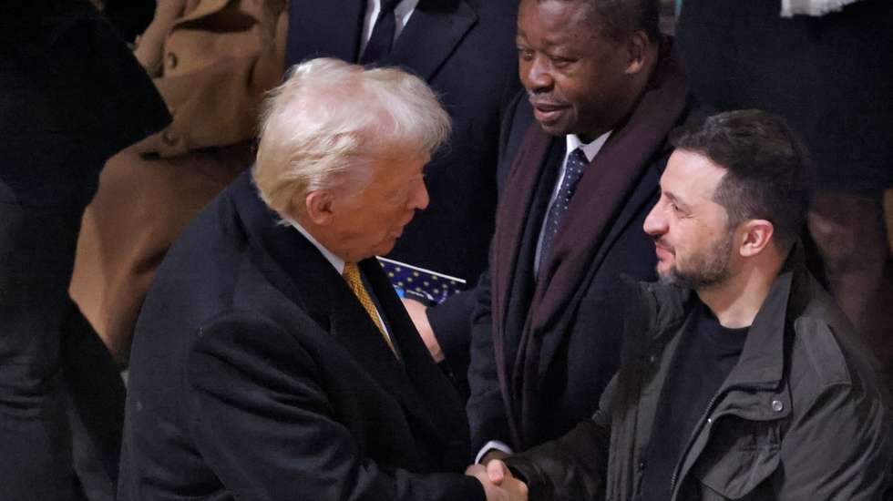 epa11763607 US President-elect Donald J. Trump (C-L) shakes hand with Ukraine's President Volodymyr Zelensky (C-R) inside Notre-Dame Cathedral ahead of a ceremony to mark the re-opening of the landmark cathedral, in Paris, France, 07 December 2024. The Notre Dame de Paris Cathedral reopens on 07 December after nearly six years of renovation work following its destruction by a fire on 15 April 2019.  EPA/LUDOVIC MARIN / POOL  MAXPPP OUT