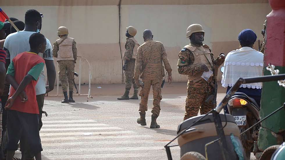 epa10216240 Burkina Faso military close a street in Ouagadougou, Burkina Faso, 30 September 2022. Gunshots have been heard near the presidential palace in Ouagadougou with what some residents claim to be an alleged coup attempt. Access has been blocked by the military to some government buildings including the national assembly and the national broadcaster. In January 2022 the current head of state, Lt-Col Paul-Henri Damiba, ousted President Roch Kabore through a coup. Lieutenant Colonel Paul-Henri Damiba has called for calm.  EPA/ASSANE OUEDRAOGO