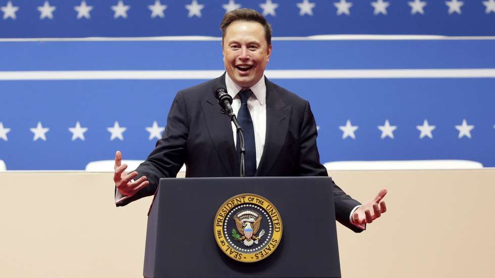epa11840269 Tesla CEO Elon Musk speaks onstage at the Capitol One Arena during inauguration ceremonies for US President Donald Trump in Washington, DC, USA, 20 January 2025. Trump was sworn in for a second term as president of the United States on 20 January. The presidential inauguration was held indoors due to extreme cold temperatures in DC.  EPA/ALLISON DINNER