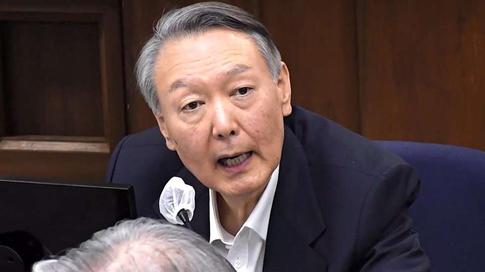 epa12647950 A handout photo made available by the Seoul Central District Court shows former South Korean president Yoon Suk Yeol making a final statement as he attends the closing arguments of his insurrection trial at the Seoul Central District Court, in Seoul, South Korea, 13 January 2026 (issued 14 January 2026). On 13 January 2026, a special counsel requested the death penalty for former President Yoon Suk Yeol, naming him the ringleader of an insurrection over his failed imposition of martial law in December 2024. Yoon pleaded innocent, maintaining that his actions were a legitimate exercise of constitutional emergency powers rather than an insurrection.  EPA/SEOUL CENTRAL DISTRICT COURT HANDOUT SOUTH KOREA OUTHANDOUT EDITORIAL USE ONLY/NO SALES