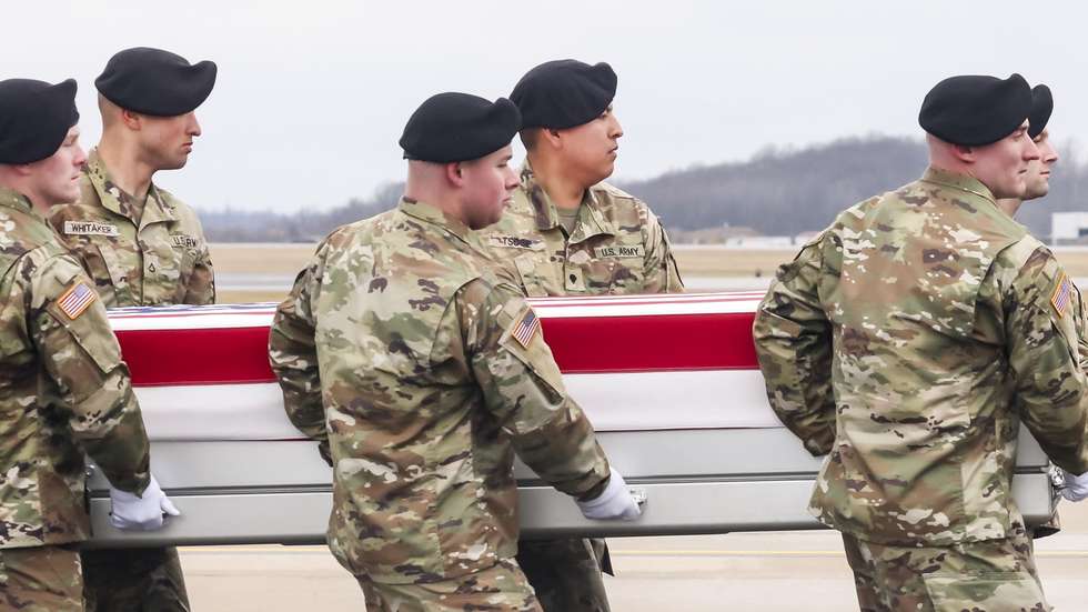 epa11121591 US President Joe Biden stands with his hand over his heart as a US Army carry team moves a flag-draped transfer case containing the remains of US Army Sergeant Breonna Moffett, during a dignified transfer of fallen US service members at Dover Air Force Base in Dover, Delaware, USA, 02 February 2024. US Army Sergeant Jerome Rivers. US Army Sergeant Breonna Moffett, and US Army Sergeant Kennedy Sanders died in a drone strike on 28 January at a military base in Jordan; forty other US troops were also injured in the attack. The enemy drone, which the White House has blamed on an Iran-backed militia, may have been mistaken for a US drone and left unimpeded, according to a preliminary report.  EPA/MICHAEL REYNOLDS