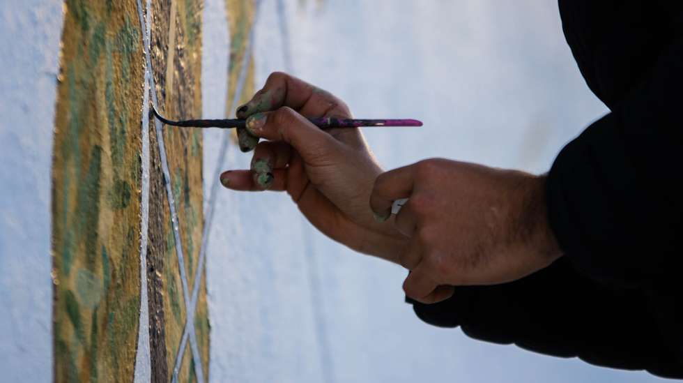 Artista a pintar