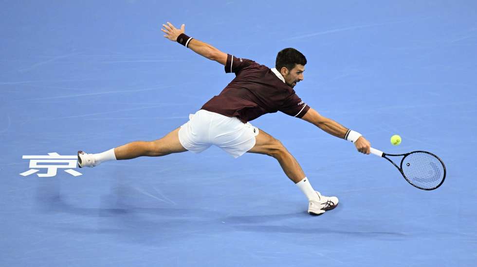 Novak Djokovic conquistou Open de Pequim após mais de uma década de ausência depois da desistência de Alex de Minaur