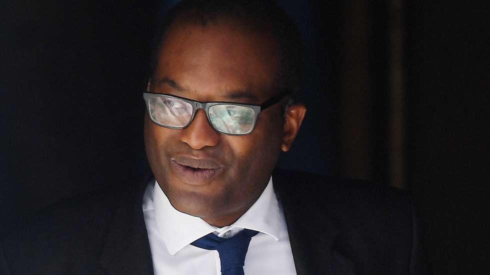 epa10000200 British Secretary of State for Business, Energy and Industrial Strategy Kwasi Kwarteng departs 10 Downing Street following a cabinet meeting in London, Britain, 07 June 2022.  British Prime Minister Boris Johnson has survived a 'vote of no confidence' over his leadership but has lost over forty percent of support from his members of the Parliament following the vote at the Parliament.  EPA/ANDY RAIN