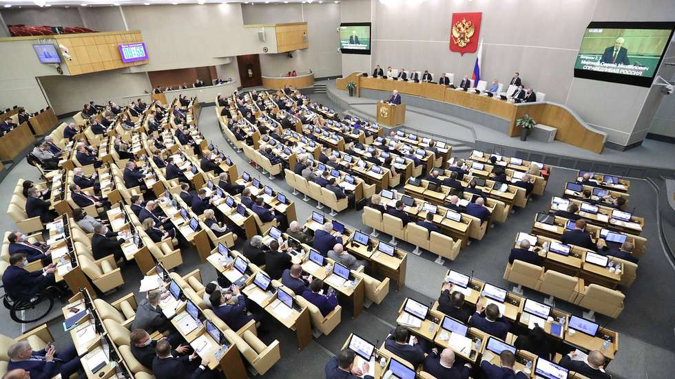 epa09777049 A handout photo made available by the press service of the Russian State Duma shows Russian lawmakers during a plenary session of the Russia's State Duma (lower house of the Russian parliament) in Moscow, Russia, 22 February 2022. The deputies of the Russia's State Duma unanimously ratified the Treaties of Friendship, Cooperation and Mutual Assistance between the Russian Federation and the Luhansk People's Republic (LPR) and between the Russian Federation and the Donetsk People's Republic (DPR). Earlier the both Treaties were submitted to the State Duma by Russian President Vladimir Putin after he signed the decrees of recognizing the self-proclaimed republics in eastern Ukraine.  EPA/RUSSIAN STATE DUMA PRESS SERVICE / HANDOUT MANDATORY CREDIT HANDOUT EDITORIAL USE ONLY/NO SALES
