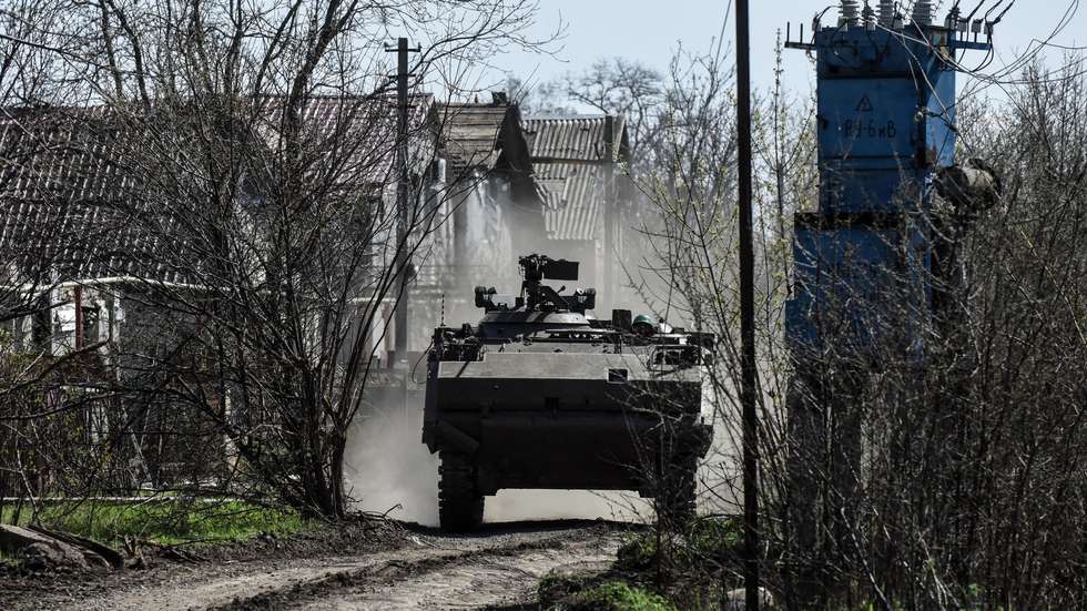 epa10567784 A Ukrainian forces' M113 APC drives at an undisclosed location near Bakhmut, Donetsk region, Ukraine, 10 April 2023. Russian troops entered Ukrainian territory on 24 February 2022, starting a conflict that has provoked destruction and a humanitarian crisis.  EPA/OLEG PETRASYUK