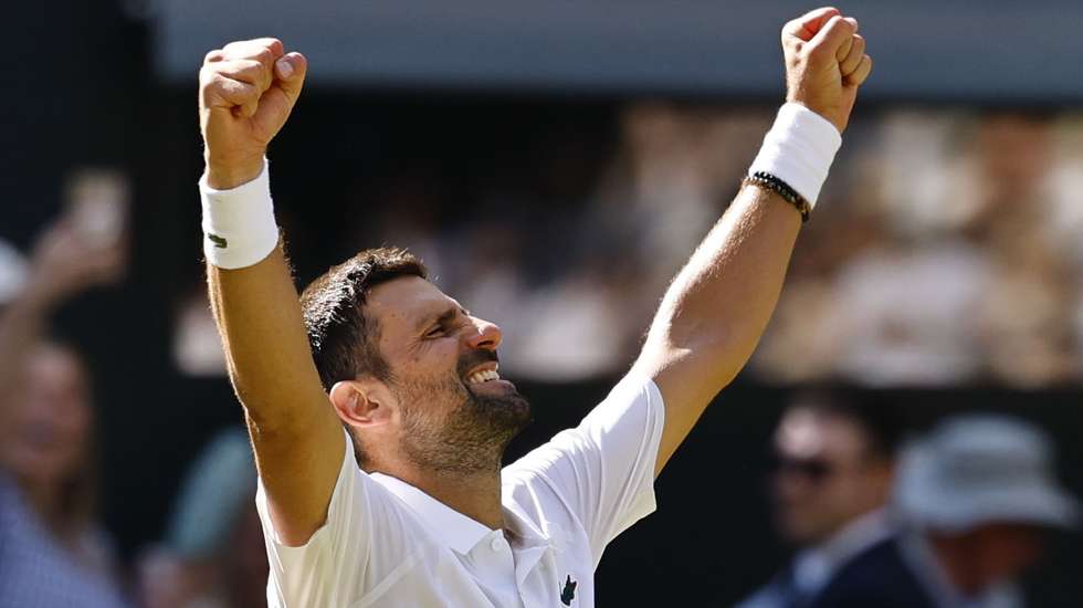 epa13083515 Novak Djokovic of Serbia celebrates after winning his Men's Singles third round match against Arthur Rinderknech of France at the Wimbledon Championships in London, Britain, 03 July 2026.  EPA/TOLGA AKMEN