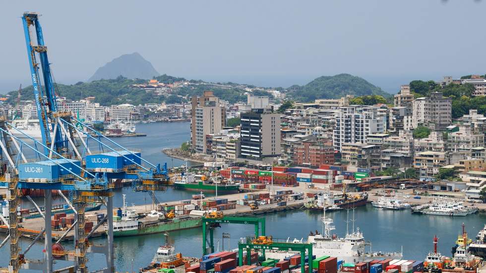 epa12287715 Shipping containers are being moved at the port in Keelung City, Taiwan, 07 August 2025. On 06 August, U.S. President Donald Trump announced that the United States intends to impose a tariff of approximately 100 percent on imported semiconductor chips, with exemptions for companies that are building or have committed to building manufacturing facilities in the United States. Taiwan, as the home of the world-leading chipmaker Taiwan Semiconductor Manufacturing Co. (TSMC), is a significant player in the global supply chain for semiconductors, which are essential for products ranging from smartphones and cars to military equipment.  EPA/RITCHIE B. TONGO