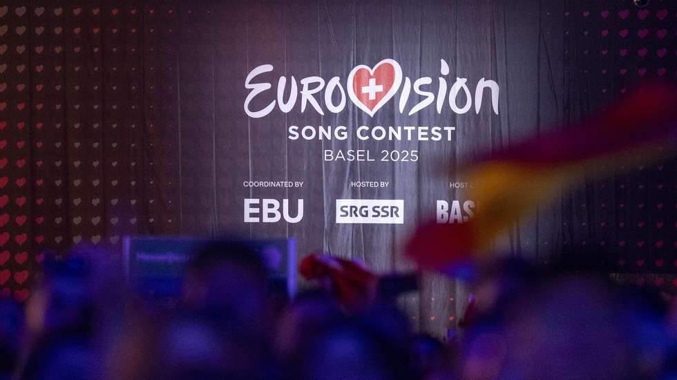 epa12111023 People watch a broadcast in the Eurovision Village during the grand final of the 69th Eurovision Song Contest (ESC) in Basel, Switzerland, 17 May 2025.  EPA/PETER SCHNEIDER