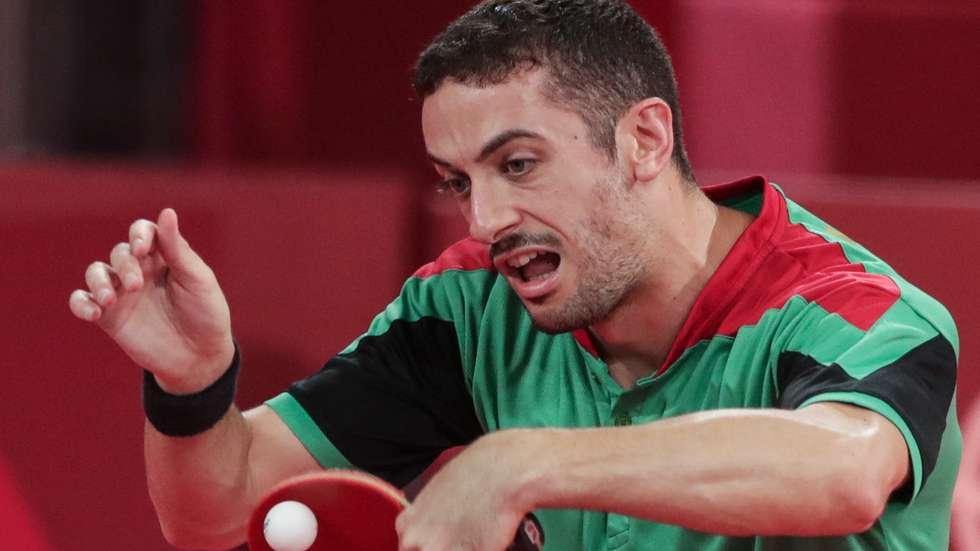 O jogador português, Marcos Freitas, em ação durante o torneio por equipas de ténis de mesa disputado no Ginásio Metropolitano em Tóquio, 01 de agosto de 2021. TIAGO PETINGA/LUSA