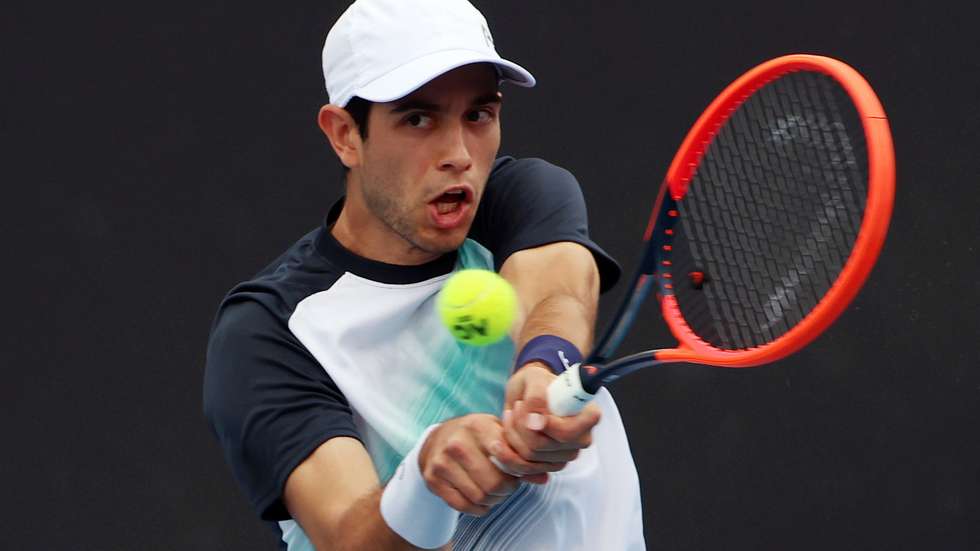 epa10408372 Nuno Borges of Portugal in action against Lorenzo Sonego of Italy during the first round match at the Australian Open tennis tournament in Melbourne, Australia, 16 January 2023.  EPA/FAZRY ISMAIL