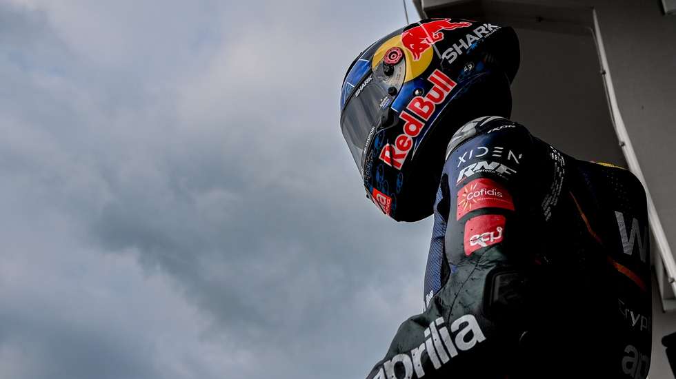 epa10696461 Portuguese rider Miguel Oliveira of CryptoDATA RNF MotoGP Team reacts during the free practice session of the Motorcycling Grand Prix of Germany at the Sachsenring racing circuit in Hohenstein-Ernstthal, Germany, 17 June 2023. The Motorcycling Grand Prix of Germany takes place on 18 June.  EPA/Filip Singer