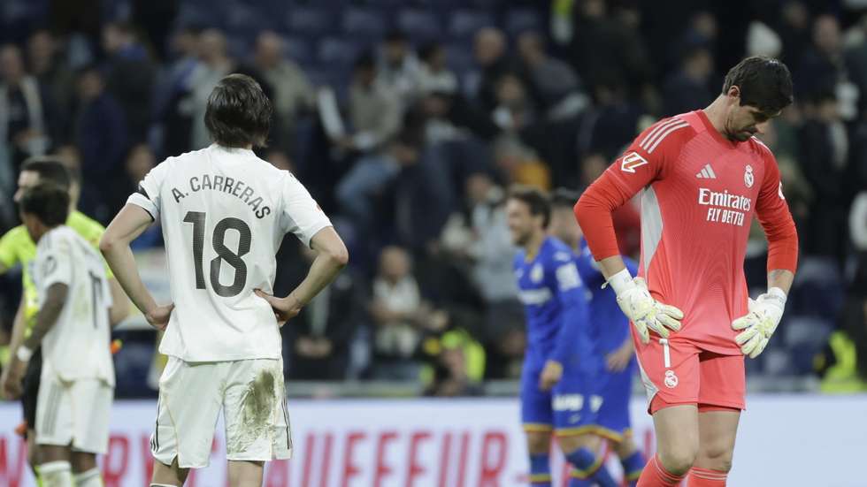 epa12790877 Real Madrid's Alvaro Carreras and goalkeeper Thibaut Courtois (R) look disappointed after losing the Spanish LaLiga soccer match between Real Madrid and Getafe CF, in Madrid, Spain, 02 March 2026.  EPA/Juanjo Martin