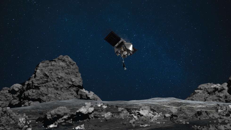 epa08758587 An undated handout photo made available by the NASA shows artist's rendering shows OSIRIS-REx spacecraft descending towards asteroid Bennu to collect a sample of the asteroid's surface (issued 20 October 2020). NASA's OSIRIS-REx is ready for touchdown on asteroid Bennu, dubbed 'high-five' manoeuvre, and scheduled for 21 October 2020.  EPA/NASA/Goddard/University of Arizona / HANDOUT  HANDOUT EDITORIAL USE ONLY/NO SALES