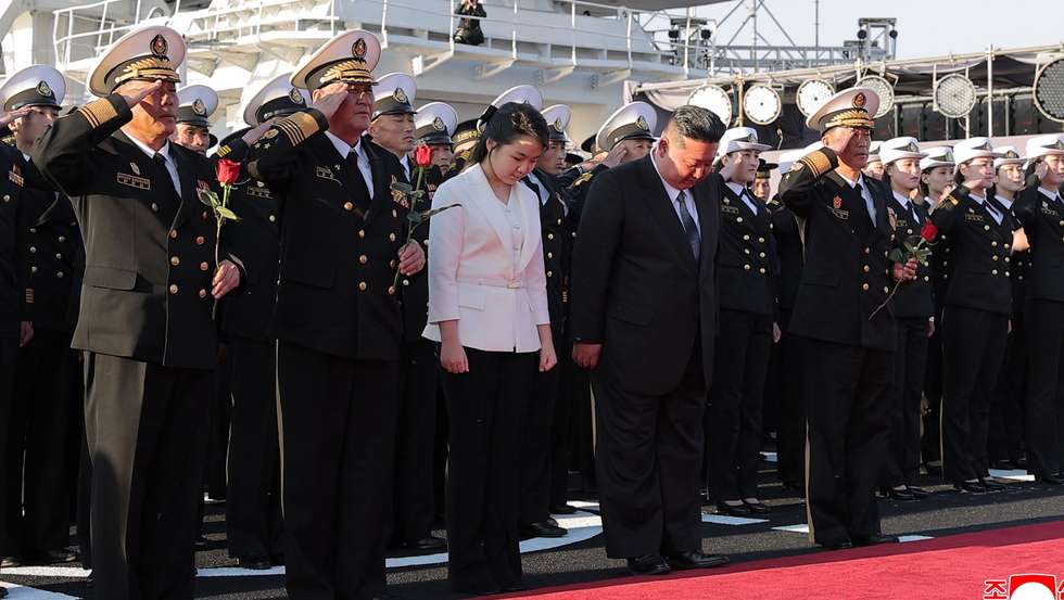 epa12055578 A photo released by the official North Korean Central News Agency (KCNA) on 26 April 2025 shows North Korean Leader Kim Jong Un and daughter Kim Ju Ae attending the launching ceremony of a newly-built destroyer at Nampho Dockyard, North Korea, 25 April 2025, on the founding anniversary of the first armed forces of the Korean People's Army (KPA).  EPA/KCNA  EDITORIAL USE ONLY