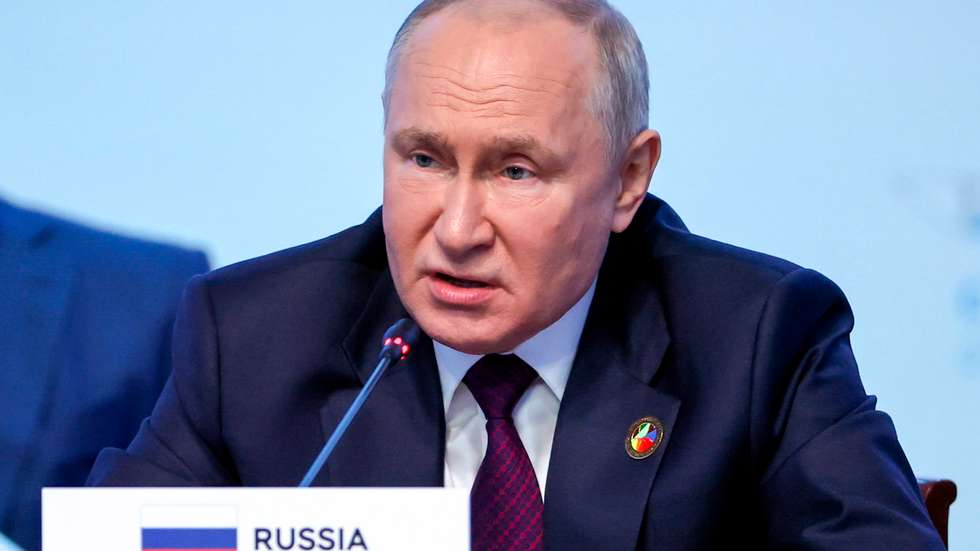 epa10773009 A handout photo made available by TASS Host Photo Agency shows Russian President Vladimir Putin addressing a plenary session during the Second Summit 'Russia-Africa' Economic and Humanitarian Forum in St.Petersburg, Russia, 28 July 2023. The Second Summit Economic and Humanitarian Forum 'Russia-Africa' takes place from 27 July to 28 at the Expoforum congress-exhibition center in St.Petersburg.  EPA/MIKHAIL TERESCHENKO / TASS HOST PHOTO AGENCY/ HANDOUT --MANDATORY CREDIT-- HANDOUT EDITORIAL USE ONLY/NO SALES