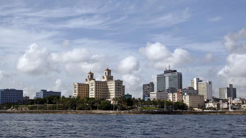 epa06848610 Under the modern city scape of Havana, Members of the Antonio Nunez Jimenez Foundation follow the route of the original expedition to the entrance to the port of Havana 30 years ago, in Havana, Cuba, 28 June 2018. Antonio Nunez Jimenez Foundation celebrates the 30 year anniversary of explorer Antonia Nunez Jimenez canoe trip from the Amazon to the Caribbean.  EPA/Ernesto Mastrascusa