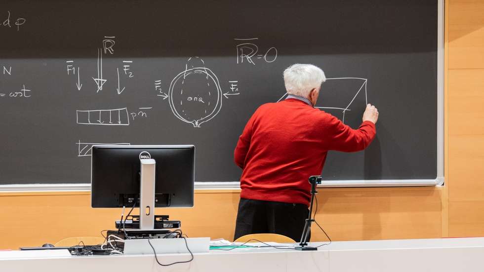 Milan, Hydraulic Lectures transmitted online given by Professor Silvio Franzetti from an empty classroom of the course of Civil Engineering at the Polytechnic of Milan